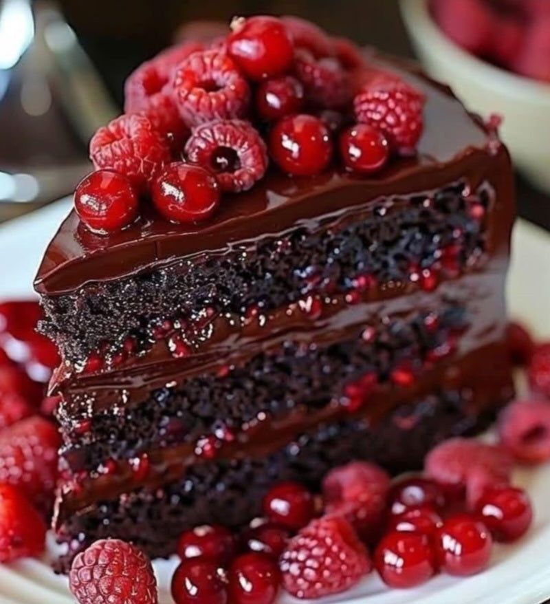 Schokoladen-Trüffeltorte mit roten Beeren/ Tarta de Trufa de Chocolate con Frutos Rojos